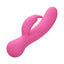 A pink rechargeable turbo rabbit vibrator lays flat and showcases its external flickering clitoral ears. 