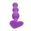 A purple beaded anal probe stands against a white backdrop with a trio of flexible beads. 