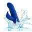 A navy blue wave motion rabbit vibrator is shown splashing in water to showcase its waterproof properties.