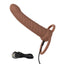 A brown dual ribbed vibrating penetrator showcases its charging cord attached to the base.