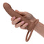 A hand model holds a brown dual ribbed penetrator for scale.