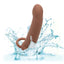 A brown rechargeable vibrating ribbed dual penetrator is shown splashing in water to showcase its waterproof properties.