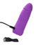 A purple mini phallic vibrator lays flat against a white backdrop with its charging cord attached to the base.