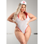 A curvy model wears a sheer white nurse mesh teddy with a nurse hat.