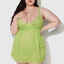 A curvy model wears a green sheer chiffon babydoll with a thong.