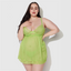 A plus size model wears a sheer green chiffon babydoll with scalloped eyelash lace trim on the upper cups and hemline. 