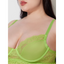 Close up of a curvy model wearing a green sheer chiffon babydoll showcasing underwired cups. 