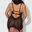 Back view of a curvy model wearing a sheer black satin chemise with adjustable shoulders + dual back straps and suspenders.