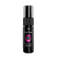 A mint flavoured deep throat oral sex spray stands against a white backdrop in a black bottle.