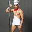 A male model wears a 4 piece chef costume with a chefs hat.  