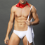 A male model wears a 4 piece chef costume with white briefs. 