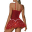 Back view of a model wearing a red velvet snowflake Christmas tulle dress with a tutu-like skirt made from layered tulle.