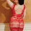 Back view of a curvy model wearing a red criss-cross sheer mini dress with an open net back panel.  