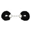 A pair of black fluffy handcuffs with a lockable trap lay flat on a white backdrop. 