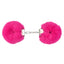 A pair of faux fur fluffy handcuffs in hot pink lays on a white backdrop.