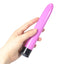 A hand model holds a pink straight multi-speed vibrator for scale.