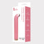 A box by Leto stands against a white back drop with a pink glassy vibrator on it with an angled tip. 