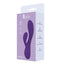 A box by Leto stands on a white backdrop with a purple silicone rabbit vibrator on it. 