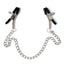 A pair of latex-covered tip nipple clamps lay flat on a white backdrop with a dangling chain connecting the two clamps.