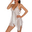 A lingerie model wears a white split-front babydoll with white embroidered lace wire-free cups and hanky hem.