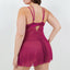 Back view of a curvy model wearing a magenta pink sheer babydoll with a g-string showcasing adjustable shoulder straps. 