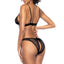 Back view of a model wearing a sheer lace crotchless lingerie set with a split-rear opening. 