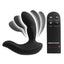 A black p-spot vibrating prostate massager stands next to its remote control. 