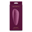 A package by NS Novelties stands against a white backdrop with a magenta compact silicone vibrator on it.