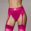 A model wears a small vibrating strap-on thong in pink with attached garter straps. 