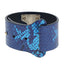 A blue holographic snake print faux leather wrist cuff with adjustable sliding push-stud closure. 