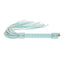 An aqua iridescent faux leather flogger with gold studs lays flat against a white backdrop. 