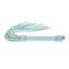 An aqua holographic flogger with gold studs lays flat on a white backdrop. 