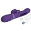 A dark purple g-spot tapping rabbit vibrator with magnetic charging points next to its cord.