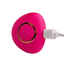 A mini remote control to a g-spot egg vibrator attached to its charging points. 