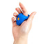 A hand model holds a silicone blue vibrating cock ring showcasing its scale.