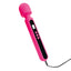 A pink wand vibrator lays flat on a white backdrop and showcases its charging cord connected to the base.