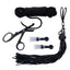 A SportSheets bondage kit lays flat on a white backdrop with a silky rope, bondage safety scissors, nipple suckers & a finger flogger.
