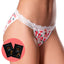 A model wears a pair of peach printed panties with lace trim and a satin bow next to 2 x sachets of peach flavoured lube. 