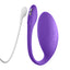 An app compatible wearable egg vibrator stands next to its magnetic reg-charging cord.