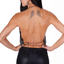 Back view of a model wearing a rhinestone mesh halter crop top with a lobster claw closure behind the neck.