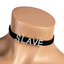 A mannequin wears a black velvet choker with the words SLAVE spelt out in diamante letters. 