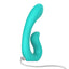 An aqua silicone rabbit vibrator sits on a white backdrop showcasing its charging cord attached to the magnetic points. 