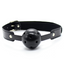 A black breathable ball gag with a faux suede leather strap sits against a white background. 