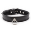 A black padded faux leather collar sits against a white backdrop with a silver o-ring.