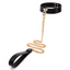A black and gold faux leather choker and chain leash with a easy snap hook closure.